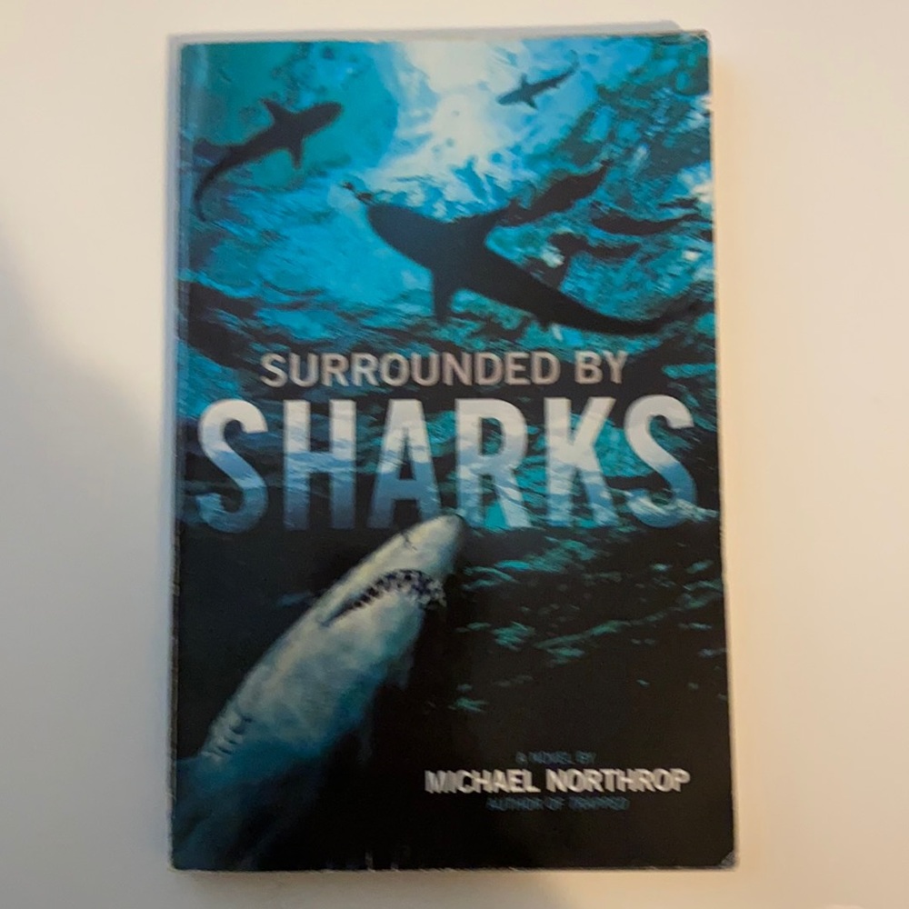 Surrounded By Sharks written by Michael Northrop
